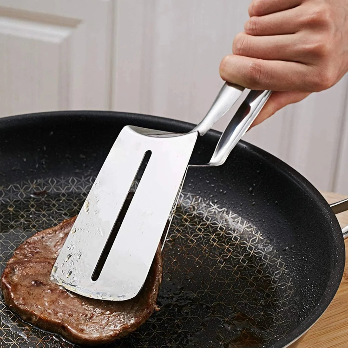 🍳🥩 Pinza-Spatola 2-in-1 in Acciaio Inox: Rivoluziona il Tuo Modo di Cucinare!