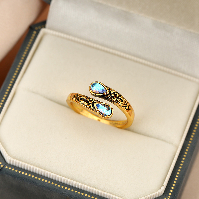 📢📢Prezzi Folli d'Estate ⏰Anello vintage regolabile aperto con zircone luminoso a goccia