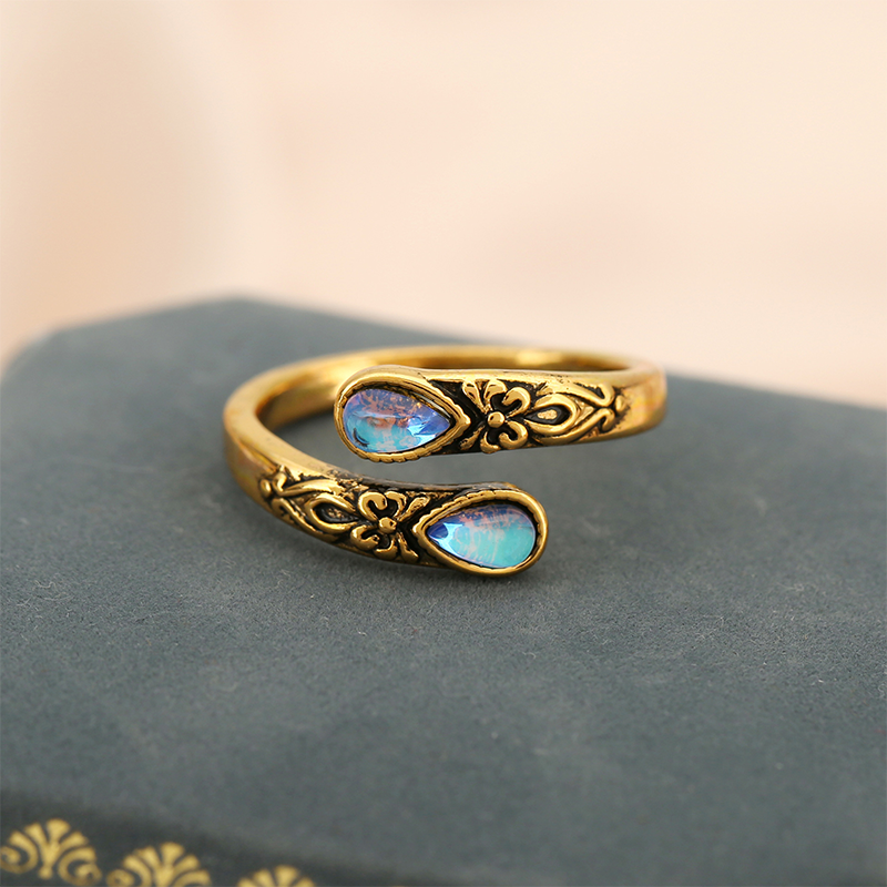 📢📢Prezzi Folli d'Estate ⏰Anello vintage regolabile aperto con zircone luminoso a goccia